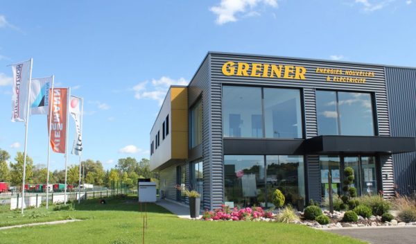 Façade de l’entreprise GREINER à Niedermodern avec son enseigne jaune